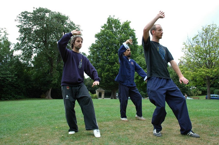 Tai Chi outdoors at Henrietta Park with Marick Baxter.